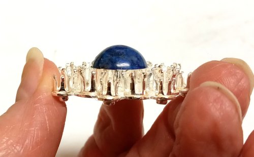 Judy Larson's CZ Explosion Necklace - , Holiday Designs, Cutting, Cutting Tool, Cutters, Filing, Finishing, How To Punch Holes, Hole Punching, Punch A Hole, Tumbling, Tumble, Tumbling Jewelry, Butane Torch, Soldering, Solder, Design, Drilling, Drill,  Set the high dome cabochon 